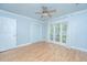 Bright bedroom with hardwood floors, large windows and access to closet at 123 Tiffany Ln, Summerville, SC 29485