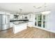 Updated kitchen with white cabinets, stainless steel appliances, and a center island at 123 Tiffany Ln, Summerville, SC 29485