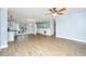 Open concept floor plan connecting the living room and kitchen with wood flooring at 123 Tiffany Ln, Summerville, SC 29485