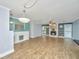 Open concept living area featuring a fireplace and views to the dining and kitchen area at 123 Tiffany Ln, Summerville, SC 29485