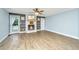 Spacious living room featuring wood floors, a decorative fireplace, and natural light at 123 Tiffany Ln, Summerville, SC 29485