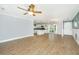 Open concept floor plan connecting living room and kitchen with wood flooring at 123 Tiffany Ln, Summerville, SC 29485