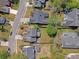 Aerial view of a residential neighborhood featuring tree-lined streets and well-maintained homes at 1310 Belhaven Dr, Mount Pleasant, SC 29466