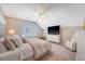 Bright bedroom with a large bed, plush pillows, and a view of the outdoors at 1310 Belhaven Dr, Mount Pleasant, SC 29466