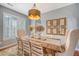 Dining room with lots of light, a modern chandelier, and seating for six at 1310 Belhaven Dr, Mount Pleasant, SC 29466
