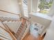 Inviting foyer with hardwood floors, staircase, and large windows for natural light at 1310 Belhaven Dr, Mount Pleasant, SC 29466