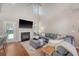 Spacious living room with hardwood floors, a cozy fireplace and vaulted ceilings at 1310 Belhaven Dr, Mount Pleasant, SC 29466