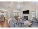 Open concept living room with hardwood floors, vaulted ceilings and lots of natural light at 1310 Belhaven Dr, Mount Pleasant, SC 29466
