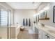 Luxurious primary bathroom features a double vanity and separate tub and shower at 1310 Belhaven Dr, Mount Pleasant, SC 29466