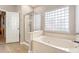 Relaxing primary bathroom features a large tub and glass shower enclosure at 1310 Belhaven Dr, Mount Pleasant, SC 29466