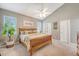 Vaulted main bedroom with ceiling fan, neutral colors, and bright windows at 1310 Belhaven Dr, Mount Pleasant, SC 29466