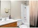 This bathroom features a vanity and a shower and tub at 1314 Garland St, North Charleston, SC 29420