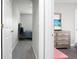 Hallway view into a bedroom featuring soft gray walls and furniture at 1314 Garland St, North Charleston, SC 29420