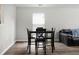 Inviting dining area featuring wood flooring and a black dining table with chairs at 1314 Garland St, North Charleston, SC 29420