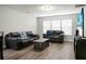 Bright living room with hardwood floors, perfect for entertaining and relaxing at 1314 Garland St, North Charleston, SC 29420