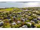 Aerial view of a home outlined in red with ocean views and close proximity to local landmarks at 1316 Thompson, Sullivans Island, SC 29482