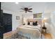 Bedroom with neutral color palette, featuring a ceiling fan and private entry at 1316 Thompson, Sullivans Island, SC 29482