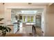 Bright kitchen featuring white cabinets, stainless steel appliances, and a central island with seating at 1316 Thompson, Sullivans Island, SC 29482