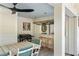 Relaxing covered patio area offers grilling kitchen and outdoor seating at 1316 Thompson, Sullivans Island, SC 29482
