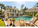 Gorgeous backyard pool and patio area perfect for outdoor relaxation and entertaining with lush landscaping at 1316 Thompson, Sullivans Island, SC 29482