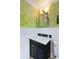 Charming powder room with trendy wallpaper and modern fixtures at 1316 Thompson, Sullivans Island, SC 29482