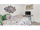 This bedroom has a decorative wall collage and a comfy bed at 1402 Camp Rd # 10C, Charleston, SC 29412