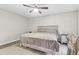 Bright bedroom features neutral colors, a comfortable bed, and ample closet space, a peaceful sanctuary at 1402 Camp Rd # 10C, Charleston, SC 29412