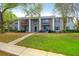 Charming two-story apartment building with well-maintained landscaping and inviting outdoor spaces and balconies at 1402 Camp Rd # 10C, Charleston, SC 29412
