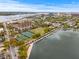 Scenic aerial view of the city, featuring a lake, tennis courts, and cityscape in the background at 141 Beaufain St, Charleston, SC 29401
