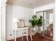 Bedroom nook shows a desk, chair, plant, and built-in mirrored closet at 141 Beaufain St, Charleston, SC 29401
