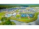Aerial view of a Primary planned community featuring new homes, lakes, tennis courts and community pool at 144 Sandy Bend Ln, Summerville, SC 29486