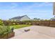 Backyard featuring a stone patio, mature landscaping and a privacy fence at 144 Sandy Bend Ln, Summerville, SC 29486