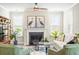 Living room fireplace featuring two pieces of heron themed artwork above the mantle at 144 Sandy Bend Ln, Summerville, SC 29486