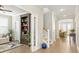 Spacious foyer with hardwood floors, a staircase, and views into the living room and dining area at 144 Sandy Bend Ln, Summerville, SC 29486