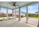 Enclosed patio with screened windows providing backyard views and natural light at 144 Sandy Bend Ln, Summerville, SC 29486