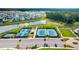 Aerial view of community tennis courts and lake at 144 Sandy Bend Ln, Summerville, SC 29486