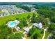 Aerial shot of neighborhood pool and houses surrounded by trees at 147 Musket Loop, Summerville, SC 29483