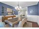 Well-appointed dining room featuring a large table, decor, and wainscotting at 147 Musket Loop, Summerville, SC 29483
