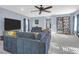 Spacious living room features gray carpet and light-blue walls at 147 Musket Loop, Summerville, SC 29483