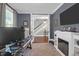Comfortable office featuring an electric fireplace, neutral tones, and an attached view of the home's stairway at 147 Musket Loop, Summerville, SC 29483