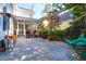 An outdoor patio featuring a seating area, a grill, a porch, and a pergola with a swing at 147 Musket Loop, Summerville, SC 29483