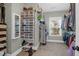 A walk-in closet with plenty of hanging and shelving space, including shoe organizers and storage containers at 147 Musket Loop, Summerville, SC 29483