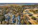 Aerial view of houses with golf course and waterway in background at 1504 Galloway Ln, Charleston, SC 29412