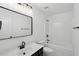 Well-lit bathroom with modern fixtures, a vanity, and a bathtub with shower at 1504 Galloway Ln, Charleston, SC 29412