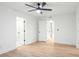 Spacious bedroom featuring wood-look floors, white trim and multiple closets at 1504 Galloway Ln, Charleston, SC 29412