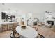 Bright dining area with an open floor plan, seamlessly connecting to the kitchen and living spaces at 1504 Galloway Ln, Charleston, SC 29412