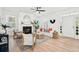 Cozy living room with a fireplace, comfortable seating, and ample natural light at 1504 Galloway Ln, Charleston, SC 29412