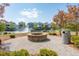 Charming community space with a fire pit, lakeside views, and inviting outdoor seating at 1537 Cultivation Ln, Mount Pleasant, SC 29466