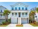 Charming two-story coastal home with a welcoming front porch, double garages, and lush landscaping at 1537 Cultivation Ln, Mount Pleasant, SC 29466