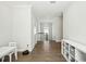 Hallway with white trim and storage unit leading to the second floor at 1537 Cultivation Ln, Mount Pleasant, SC 29466